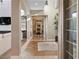 Hallway offering views of living spaces, high ceilings and great natural lighting at 26 Olympia Outlook Dr, Las Vegas, NV 89141