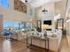 Bright and spacious living room featuring floor to ceiling windows offering amazing mountain views at 26 Olympia Outlook Dr, Las Vegas, NV 89141