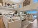 Open-concept living room with high ceilings, natural light, and panoramic city views at 26 Olympia Outlook Dr, Las Vegas, NV 89141