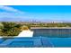 Relaxing poolside view with scenic city backdrop at 26 Olympia Outlook Dr, Las Vegas, NV 89141