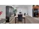 Dining area featuring modern furniture, views of living area and kitchen, and ample space for entertaining at 2849 Mincio St, Henderson, NV 89044