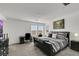 Comfortable main bedroom suite featuring a window, desk and queen bed at 2849 Mincio St, Henderson, NV 89044