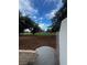 Inviting backyard view with a landscaped yard and mature trees at 2857 Queens Courtyard Dr, Las Vegas, NV 89109