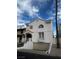 Lovely two-story home featuring an attached garage, quaint balcony, and front yard at 2857 Queens Courtyard Dr, Las Vegas, NV 89109