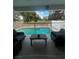 Patio seating area with a view of the pool and golf course, perfect for relaxation and entertaining at 2857 Queens Courtyard Dr, Las Vegas, NV 89109