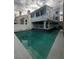 Back of house featuring a refreshing in-ground pool for relaxation and recreation at 2857 Queens Courtyard Dr, Las Vegas, NV 89109