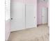 Bedroom featuring a sliding door closet with white doors and carpeted flooring at 3032 Hartley Cove Ave, North Las Vegas, NV 89081