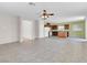 This open-concept home has a tile floor, neutral walls, and a spacious feel for entertaining at 3032 Hartley Cove Ave, North Las Vegas, NV 89081