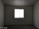 Bedroom with carpet and a bright window at 3123 Inlet Bay Ave, North Las Vegas, NV 89031