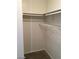 Walk in closet with corner shelves and carpeted floor at 3123 Inlet Bay Ave, North Las Vegas, NV 89031