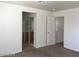 Main bedroom area with a view into the main bathroom and hallway at 3123 Inlet Bay Ave, North Las Vegas, NV 89031