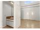 Elegant bathroom with marble countertops, tile floors, and double doors at 313 Firestone Dr, Las Vegas, NV 89145