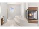 Inviting bathroom features soaking tub, shower, and fireplace for a spa-like experience in the comfort of home at 313 Firestone Dr, Las Vegas, NV 89145