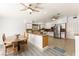Open concept kitchen features stainless steel appliances and granite countertops at 313 Firestone Dr, Las Vegas, NV 89145