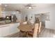 Open-concept kitchen and dining area with stainless steel appliances and views of the living room at 313 Firestone Dr, Las Vegas, NV 89145