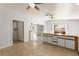 Eat in kitchen features tile floors, ample cabinet space and granite countertops at 313 Firestone Dr, Las Vegas, NV 89145