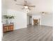 Spacious living room with hardwood flooring, modern ceiling fans and fireplace at 313 Firestone Dr, Las Vegas, NV 89145