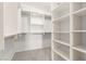 Well-organized walk-in closet with custom shelving, offering efficient storage and maximizing space at 313 Firestone Dr, Las Vegas, NV 89145