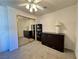 Bedroom showcasing a full mirrored closet, a desk area and a chest of drawers at 3263 Quail Song Dr, Laughlin, NV 89029