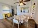 Cozy dining area next to the kitchen with stylish decor and abundant natural light at 3263 Quail Song Dr, Laughlin, NV 89029