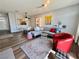 Open-concept living space with stylish decor, comfortable seating, and seamless flow to dining area at 3263 Quail Song Dr, Laughlin, NV 89029