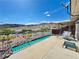 The back patio offers a great space to enjoy the mountain views and outdoor living at 3263 Quail Song Dr, Laughlin, NV 89029