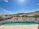 Enjoy the desert mountain view from this lovely home's covered back patio at 3263 Quail Song Dr, Laughlin, NV 89029