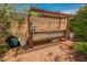Wooden structure for garden plants in a landscaped backyard at 3704 Blairmoor St, North Las Vegas, NV 89032