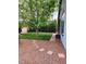 Nice backyard featuring desert landscaping, stepping stones and mature trees at 3704 Blairmoor St, North Las Vegas, NV 89032