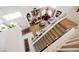 Elevated view of the foyer featuring a winding staircase, living room, and entrance at 3704 Blairmoor St, North Las Vegas, NV 89032