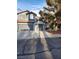 Charming two-story home featuring a two-car garage and well-maintained front yard at 3704 Blairmoor St, North Las Vegas, NV 89032