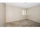 Bedroom featuring carpet, neutral walls, and a window bringing in natural light at 3751 Crellin Cir, Las Vegas, NV 89120