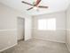 This bedroom features carpet, neutral walls, a window, and a closet with a sliding door at 3751 Crellin Cir, Las Vegas, NV 89120