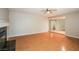 Spacious living room with hardwood floors, fireplace, and a mirrored wall at 3751 Crellin Cir, Las Vegas, NV 89120