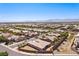 Impressive aerial shot of a Primary-planned community with uniform roofs and organized street layout at 3904 Redbreast Ln, North Las Vegas, NV 89084