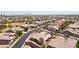 Expansive aerial view of a residential area showcasing numerous single-Gathering homes and neighborhood streets at 3904 Redbreast Ln, North Las Vegas, NV 89084