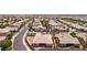 Drone shot of community featuring desert landscaping, offering a serene suburban atmosphere at 3904 Redbreast Ln, North Las Vegas, NV 89084