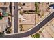 Overhead shot of a home, highlighting its roof, landscaping, and proximity to neighboring residences at 3904 Redbreast Ln, North Las Vegas, NV 89084