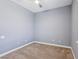This bedroom offers neutral walls, carpeted floors, and ceiling fan for a cozy retreat at 3904 Redbreast Ln, North Las Vegas, NV 89084