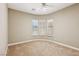 Bright bedroom with neutral walls and carpet and a ceiling fan at 3904 Redbreast Ln, North Las Vegas, NV 89084