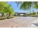 Image of a community entrance featuring decorative landscaping and a covered entryway at 3904 Redbreast Ln, North Las Vegas, NV 89084