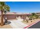 Inviting single-story home with a three-car garage, desert landscaping, and a spacious driveway at 3904 Redbreast Ln, North Las Vegas, NV 89084
