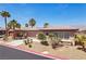 Well-maintained single-story home with mature palm trees, a three-car garage, and landscaped yard at 3904 Redbreast Ln, North Las Vegas, NV 89084