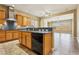 Beautiful kitchen featuring stainless steel appliances and granite countertops, flowing into the living room at 3904 Redbreast Ln, North Las Vegas, NV 89084
