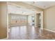 Open-concept living area featuring tile flooring, neutral walls, and sliding glass doors to outdoor space at 3904 Redbreast Ln, North Las Vegas, NV 89084