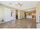 Open layout showcasing seamless flow between living area with patio access and the modern kitchen at 3904 Redbreast Ln, North Las Vegas, NV 89084
