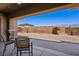 Spacious covered patio perfect for outdoor dining and entertaining, with views of the backyard at 3904 Redbreast Ln, North Las Vegas, NV 89084