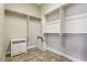 Spacious walk-in closet with built-in shelving and drawers providing ample storage space at 3904 Redbreast Ln, North Las Vegas, NV 89084
