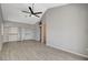 Primary bedroom boasts vaulted ceilings, ceiling fan, and closet at 4052 Compass Rose Way, Las Vegas, NV 89108