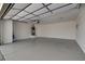 The garage boasts a spacious area, epoxy flooring, and a convenient entry door to the interior at 4052 Compass Rose Way, Las Vegas, NV 89108